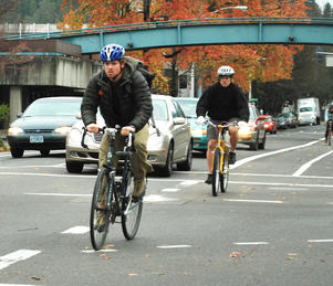 Bicycle commuter on city street