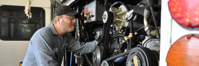 mechanic-working-on-engine mechanic-working-on-engine