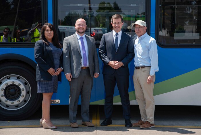 General Manager Aurora Jackson, Deputy Assistant Secretary Edward McGlone, Secretary Buttigieg and Representative DeFazio