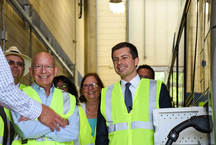 DeFazio and Buttigieg learn about electric bus charging with Director of Fleet Management Matt Imlach