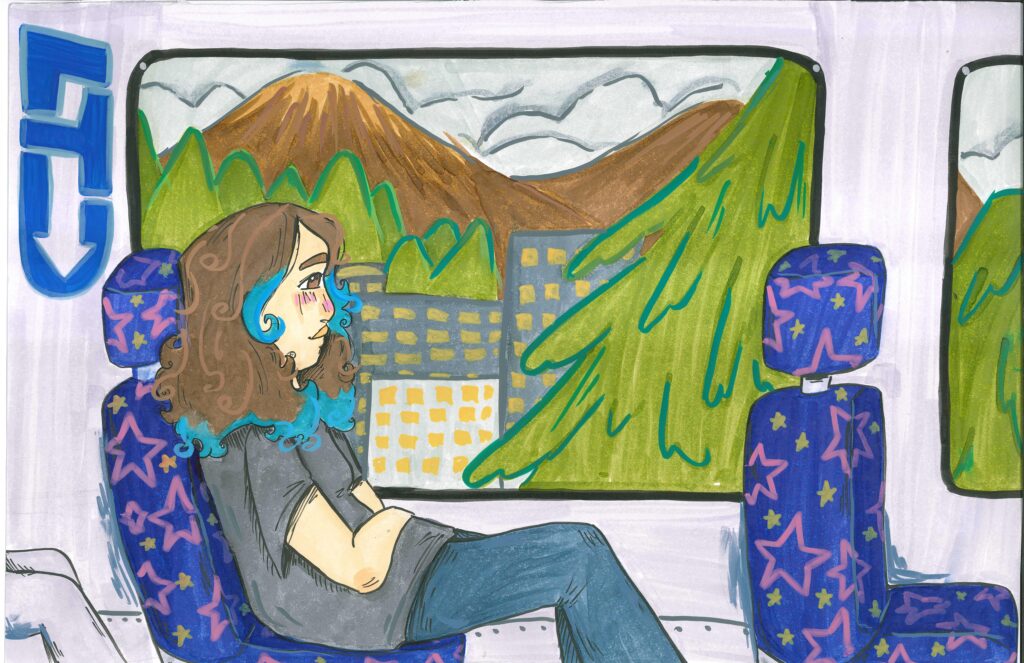 A person with long brown and blue hair sits on a train with star-patterned seats, looking out the window at mountains, trees, and buildings under a cloudy sky.